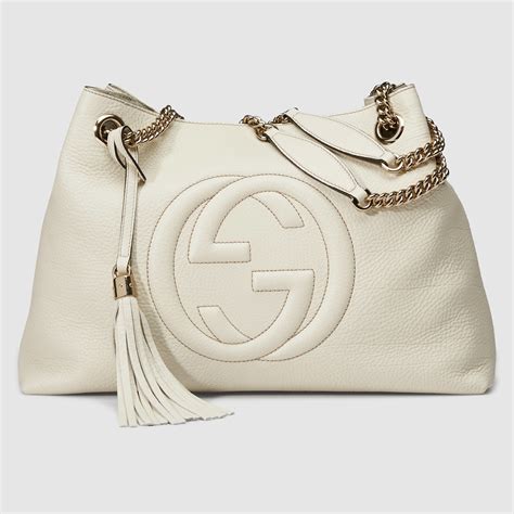 Discover the GUCCI Attache bag collection handbags in leather, suede and. . Gucci white purse